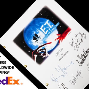 May include: A white script for the movie E.T. The Extra-Terrestrial with signatures from Steven Spielberg, Melissa Mathison, and others. The script cover features a blue planet with a silhouette of E.T. and a boy riding a bicycle.
