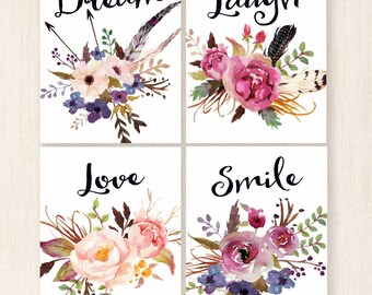May include: Four printable wall art prints with watercolor floral bouquets and inspirational words. The words are "Dream", "Laugh", "Love", and "Smile".