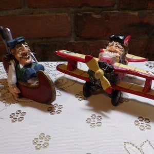 David Frykman, David Frykman vintage Il giocatore di golf in canoa, 1997 Wood Frykman Babbo Natale in aereo, Frykman your Choice, Morethebuckles