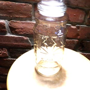 Vintage 80s Planters Advertising Mr. Peanut Glass Jar Canister, 1981 lidded decorative collectible jar, Floral Embossed jar, Morethebuckles