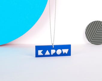 Blue transparent mini KAPOW typographic acrylic statement necklace