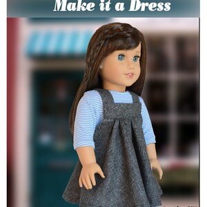 May include: A doll wearing a gray dress with a blue and white striped shirt underneath. The dress has a bib style top with straps. The doll has brown hair and blue eyes. The text "Make it a Dress" is at the top of the image. The text "SofieClareee Doll Fashion" is at the bottom of the image.