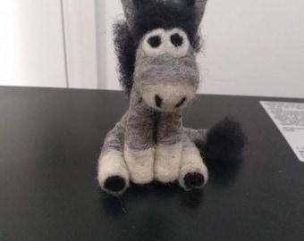 Little donkey looking for a home and someone to nuzzle!