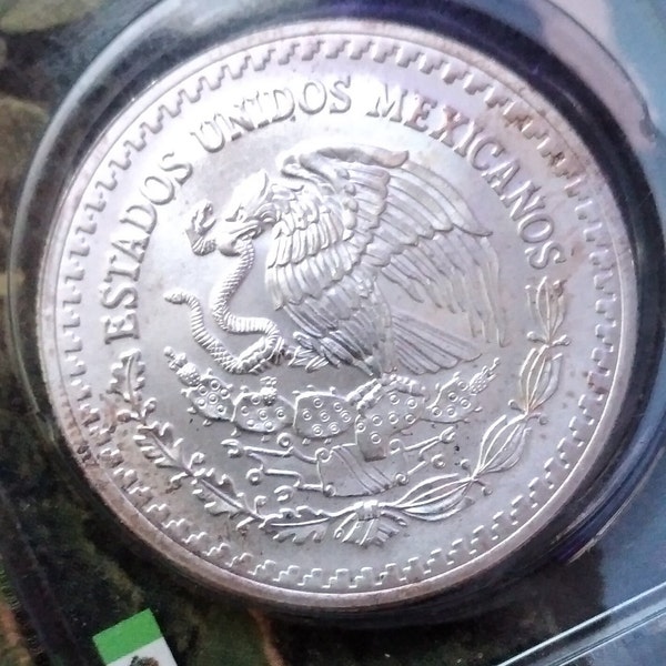 1993 Mexico Libertad 1-ounce silver coin Slight Toning Very Nice in sealed Littleton pack!