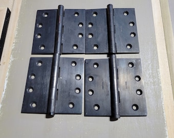 Set of four 4 inch Baldwin black brass hinges