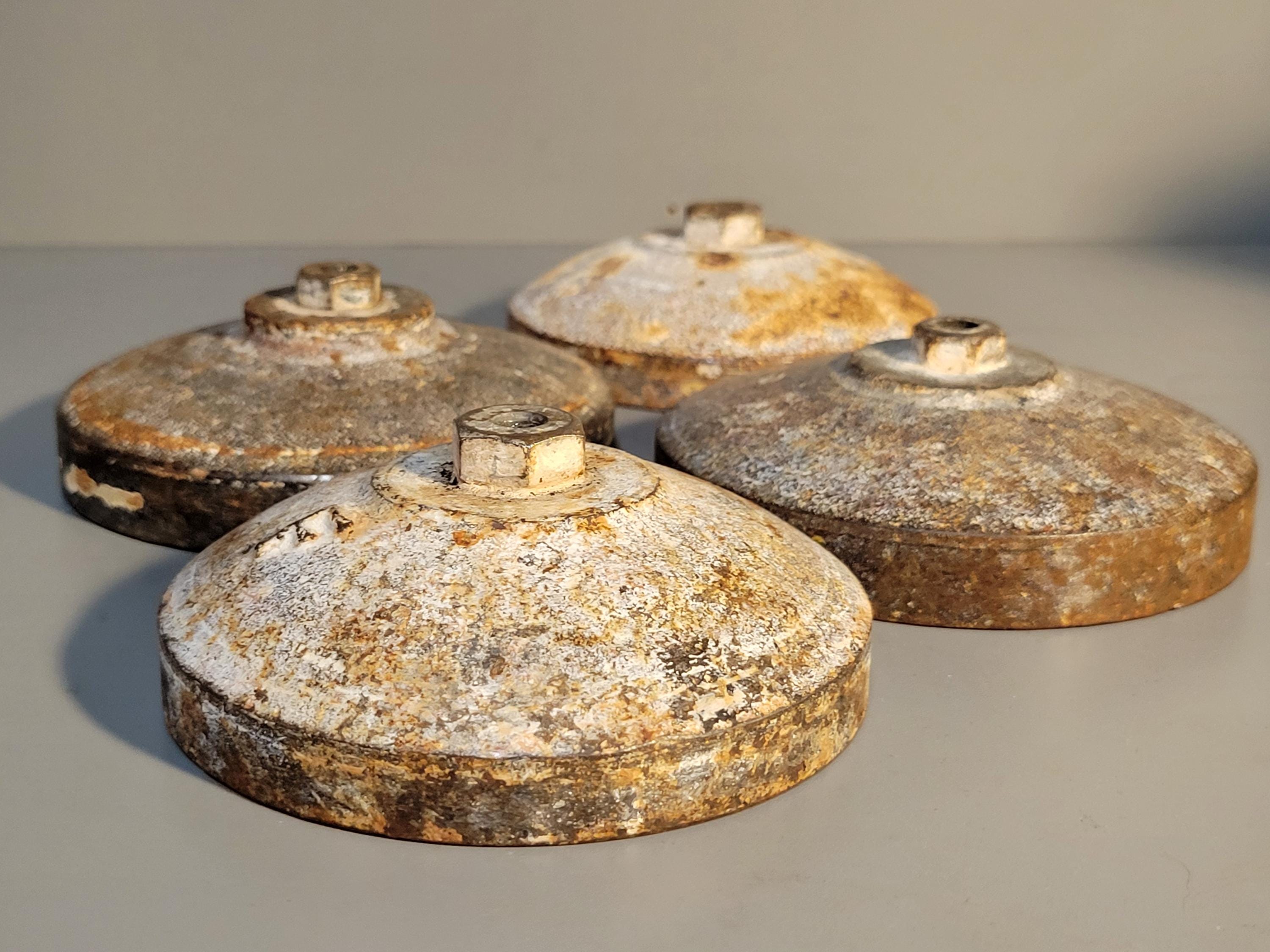 Industrial Salvage set of four, 4 inch Round Heavy Steel. Small Lamp, Sculpture Stand Cast Iron Patina base.