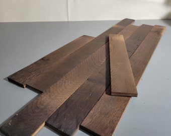 Oak wood strips for the woodworker. Reclaimed wine soaked Bundle of woodworking materials