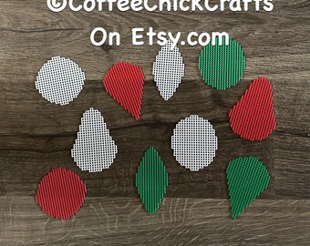 May include: A set of 10 plastic canvas ornaments in red, white, and green. The ornaments are shaped like circles, teardrops, and leaves.  @CoffeeChickCrafts On Etsy.com
