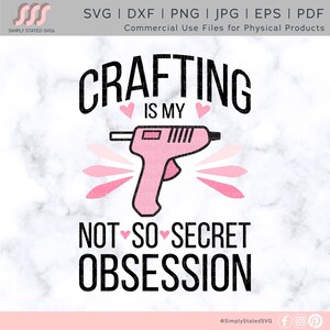 May include: Black and white text graphic with a pink glue gun and hearts that reads "Crafting is my not so secret obsession".
