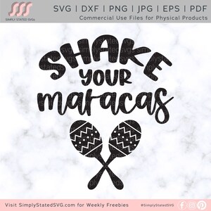 Puede incluir: Diseño gráfico en blanco y negro con el texto "Shake Your Maracas" y un par de maracas con un diseño en blanco y negro.