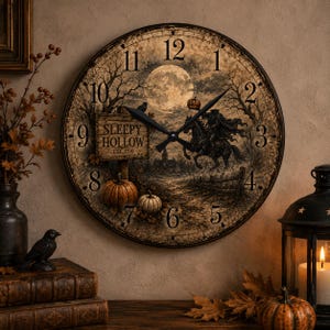 May include: A round wall clock featuring a Sleepy Hollow theme with a full moon, a headless horseman, and pumpkins. The clock face displays black numerals from 1 to 12, a wooden sign reading SLEEPY HOLLOW EST. 1790, and black clock hands.