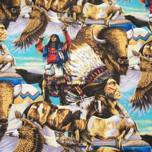May include: Fabric with a Native American theme. The design features illustrations of Native American figures, bison, eagles, horses, and owls. The color palette includes shades of brown, blue, red, and white, creating a detailed and vibrant pattern.
