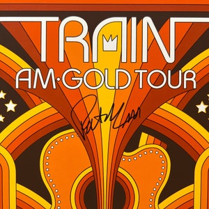Póster de la gira Train Am Gold autografiado por toda la banda.