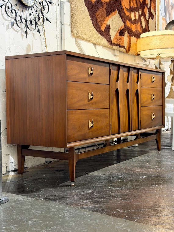Broyhill Brasilia Triple Dresser in Walnut, Circa 1960s - *Please ask for a shipping quote before you buy.