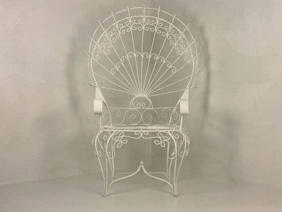 Wrought iron online peacock chair
