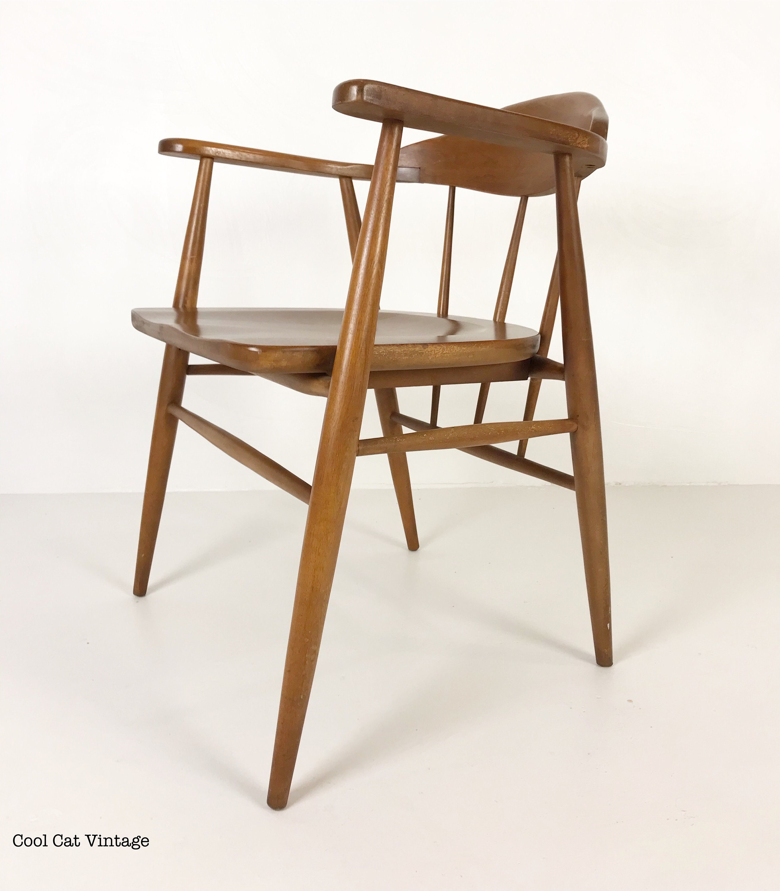 Four Modern Walnut Stained Spindle Back Captain’s Chairs, Circa 1960s