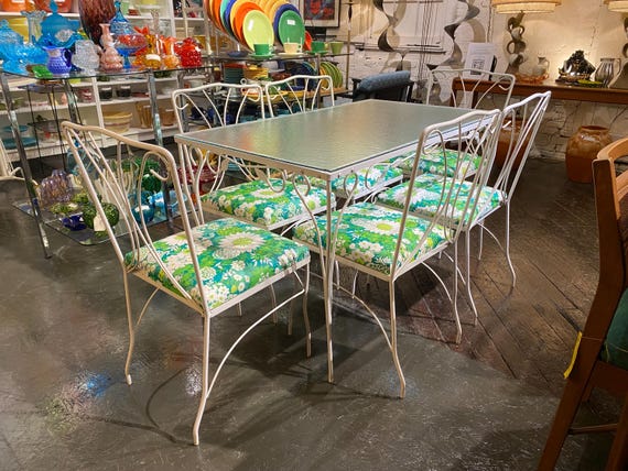 Wrought Iron Patio Table with Six Matching Chairs by SYD Leach of Alabama INC., C.1960s - *Please ask for a shipping quote before you buy.