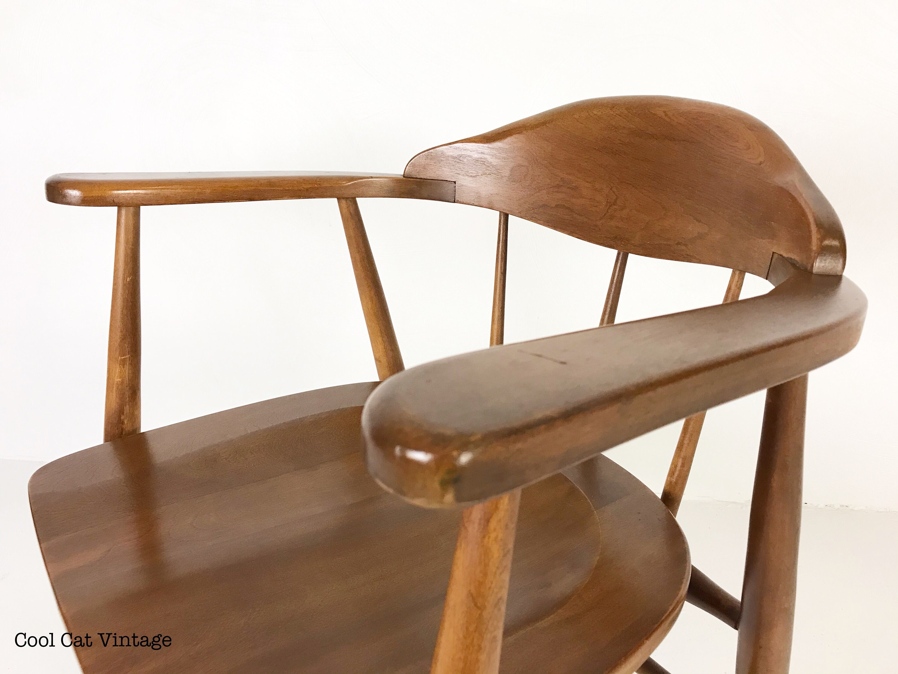 Four Modern Walnut Stained Spindle Back Captain’s Chairs, Circa 1960s