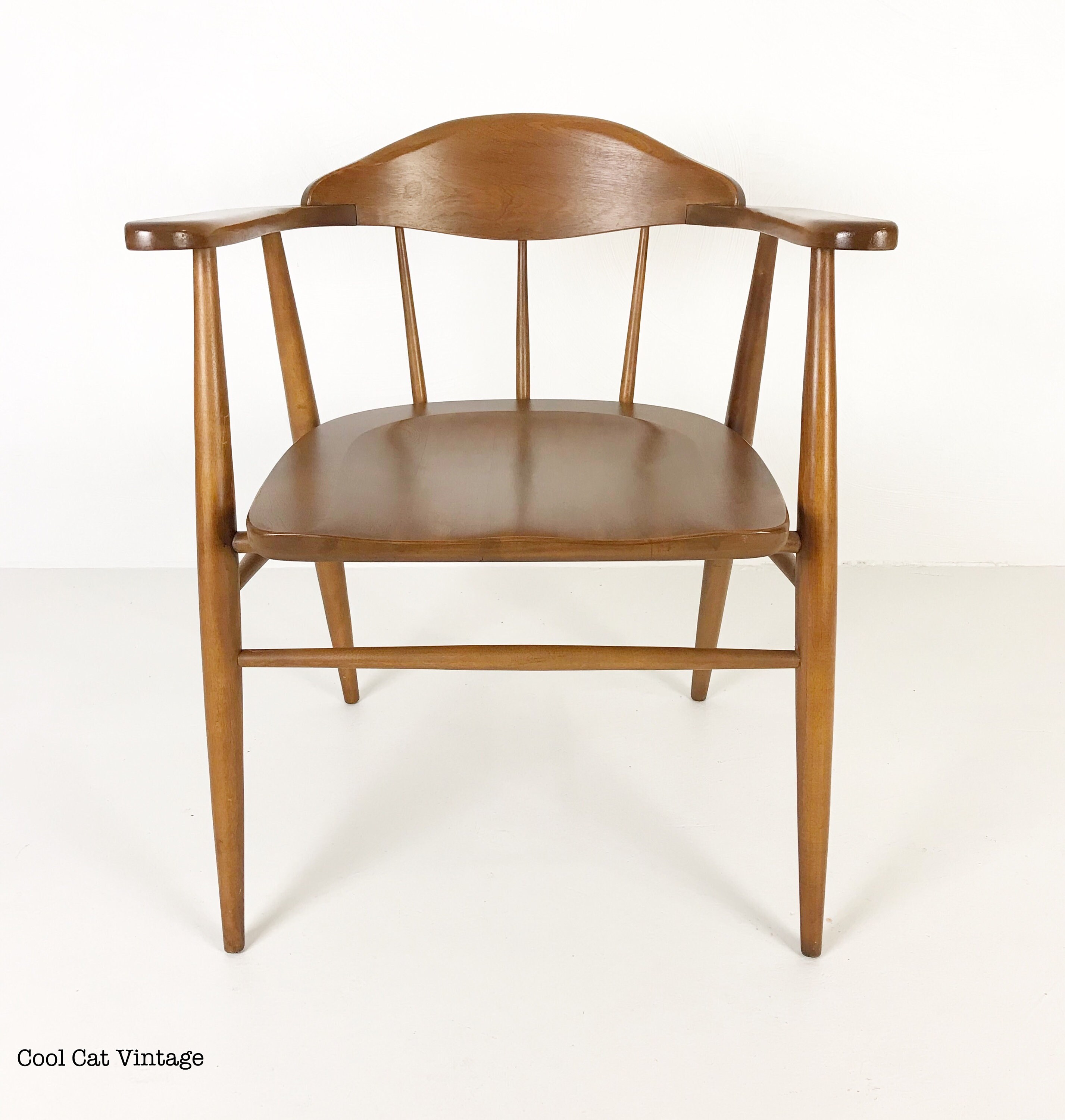 Four Modern Walnut Stained Spindle Back Captain’s Chairs, Circa 1960s