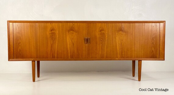 Teak Tambour Credenza by Svend Aage Larsen for Faarup Mobelfabrik, Circa 1960s - *Please request a shipping quote before you purchase.