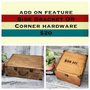 May include: Two wooden boxes with brass hardware. The box on the left has a side bracket and the text "SJB" engraved on the front. The box on the right has corner hardware and the text "RGB III" engraved on the front. Add-on feature: Side bracket or corner hardware $20.