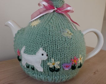 Hand Knitted Tea Cosy "White Dog, Bird and Butterfly".  Dog Lovers Gift, Mothers Day Gift, Novelty Teacosy. Small, Medium or Large.