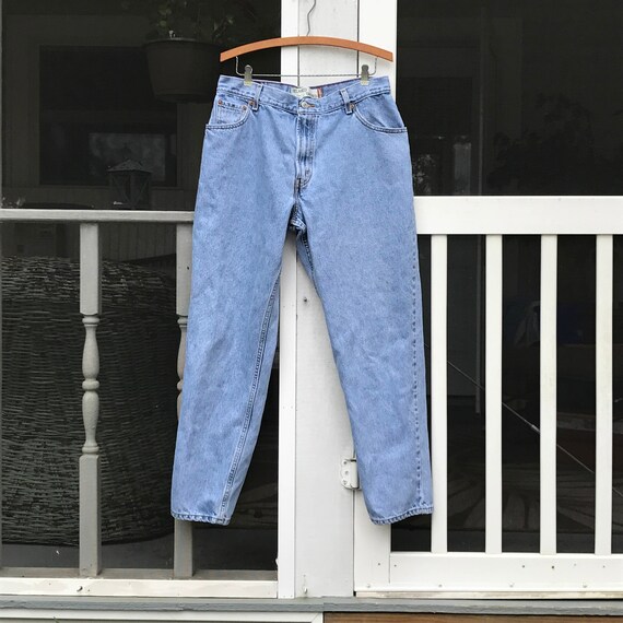 levis 550 high waisted jeans