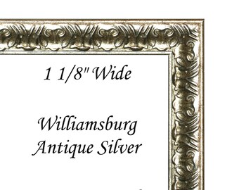 May include: A silver picture frame with an ornate design. The frame is 1 1/8 inches wide and 1/4 inch deep. It is labeled "Williamsburg Antique Silver" and "DIY Wood Picture Frame".