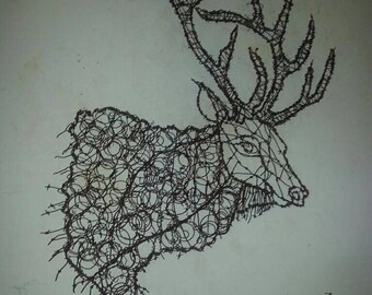 May include: A wire sculpture of a deer head with large antlers. The sculpture is made of twisted wire and is a unique and interesting piece of art.