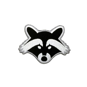 May include: Black and white embroidered patch of a raccoon face.