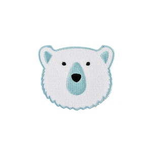 May include: Embroidered patch of a polar bear's face. The bear is white with light blue detailing on the ears, nose, and border. It has black eyes and a dark blue nose. The patch has a textured finish.