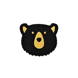 May include: Black felt bear head applique with yellow felt nose and eyes.