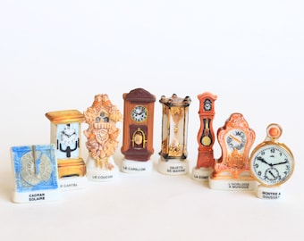 Feves "Clocks"- Bean Fève- Hand painted- High gamme- Porcelain/ceramic figurines- Collection- Fabophilie