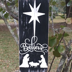 Believe nativity wood sign