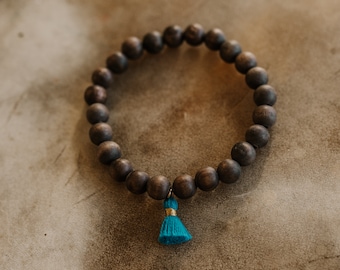 natural matte dark brown olive wood bracelet with mini teal tassel | 8mm yoga bracelets | meditation bracelets