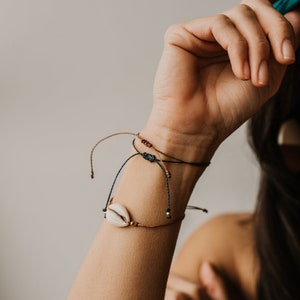 G I V E . B A C K bracelets | 20% of proceeds go back to our mother earth via environmental defense fund | friendship string bracelets