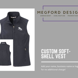 May include: A dark blue soft-shell vest with a zipper closure and a pocket on the side. The vest has a small logo embroidered on the left chest. "MEGFORD DESIGNS" is printed above the text "EMBROIDERY SUBLIMATION PROMOTIONALS". The text "CUSTOM SOFT-SHELL VEST" is printed below the text "Add your name, business name or logo for no additional charge!"