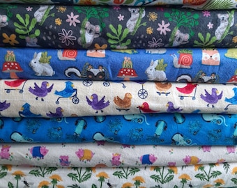 Tela de franela de algodón con estampado animal: pájaros, lagartos, koalas, cortada a medida.