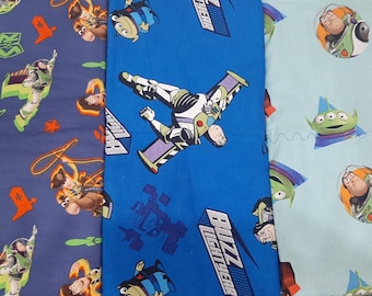 Baby 3 piece gift set made with licensed Disney Toy Story fabric. Receiving blanket, bib burp cloth, great gift for any baby shower/gender