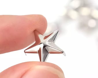 CraftbuddyUS - 100 piezas de 10 mm de estrella de metal plateada, diseño de punk, rock, gótico, motero, bricolaje