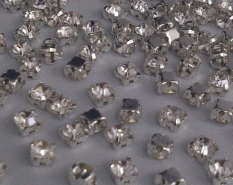 CraftbuddyUS 50 X4.3mm SEW on Clear Silver Set Glass Crystal Diamante Rhinestones Dress