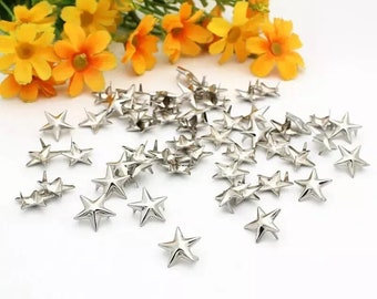 CraftbuddyUS 100 pendientes de metal plateado con forma de estrella de 15 mm para punk, rock, gótico, motero, bricolaje