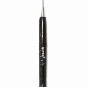 May include: A black tool with a silver needle tip and a black handle with white glitter. The handle has the text "bijoux by mel" printed on it.