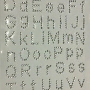CraftbuddyUS 56 piezas de diamantes de imitación transparentes autoadhesivos con letras de cristal A-Z