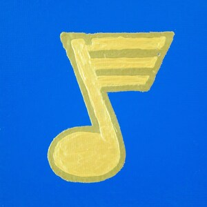 May include: A gold musical note painted on a blue background. The note has a thick outline and is stylized with lines across the top.