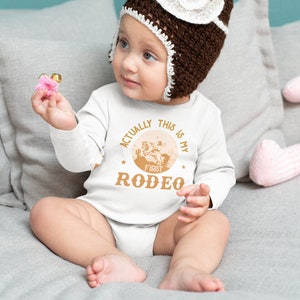 Actually This Is My First Rodeo Bodysuit Cute Cowboy & Cowgirl Pregnancy Announcement Shirt horse Rodeo Gift Yeehaw Tee 839 image 3