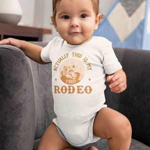 Actually This Is My First Rodeo Bodysuit Cute Cowboy & Cowgirl Pregnancy Announcement Shirt horse Rodeo Gift Yeehaw Tee 839 image 2