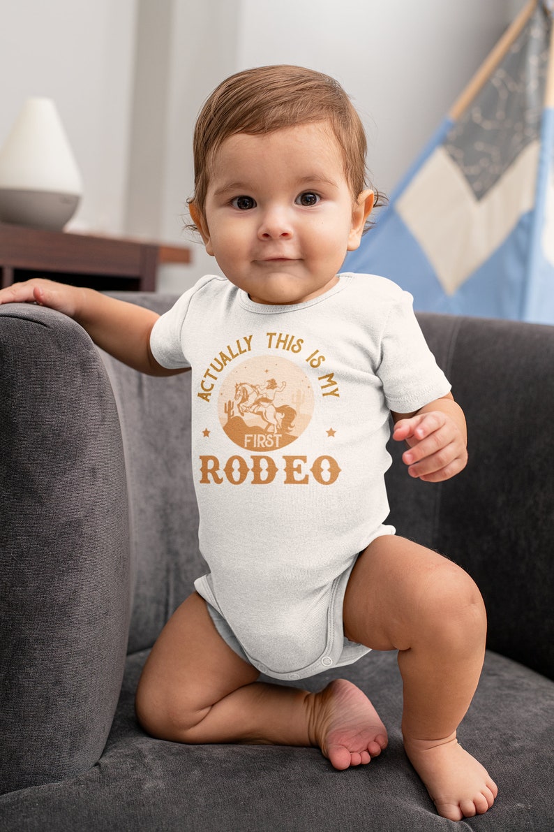 Actually This Is My First Rodeo Bodysuit Cute Cowboy & Cowgirl Pregnancy Announcement Shirt horse Rodeo Gift Yeehaw Tee 839 image 2