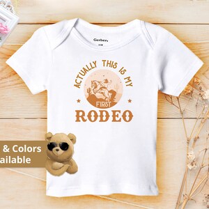 Actually This Is My First Rodeo Bodysuit Cute Cowboy & Cowgirl Pregnancy Announcement Shirt horse Rodeo Gift Yeehaw Tee 839 Slip-On Shirt | Short Sleeve | * See Description *