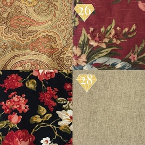 May include: Four fabric swatches, each with a different pattern. The top left swatch is a paisley pattern in shades of brown, beige, and red. The top right swatch is a floral pattern in shades of red, pink, and green on a burgundy background. The bottom left swatch is a floral pattern in shades of red and white on a black background. The bottom right swatch is a solid beige fabric with a subtle texture.